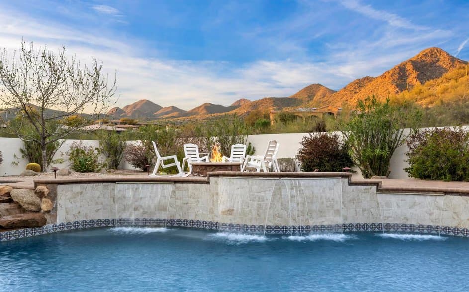 Pool with water features and fire pit facing desert mountains, 12970 E Cibola Rd, Scottsdale