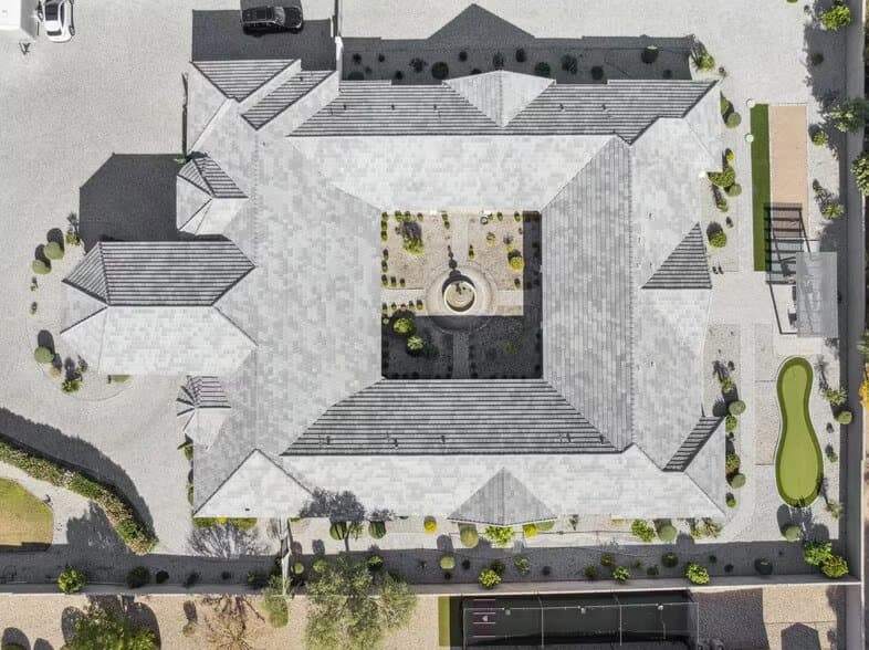 Aerial view of the courtyard-plan residence and grounds, 24832 N 91st Ave, Peoria
